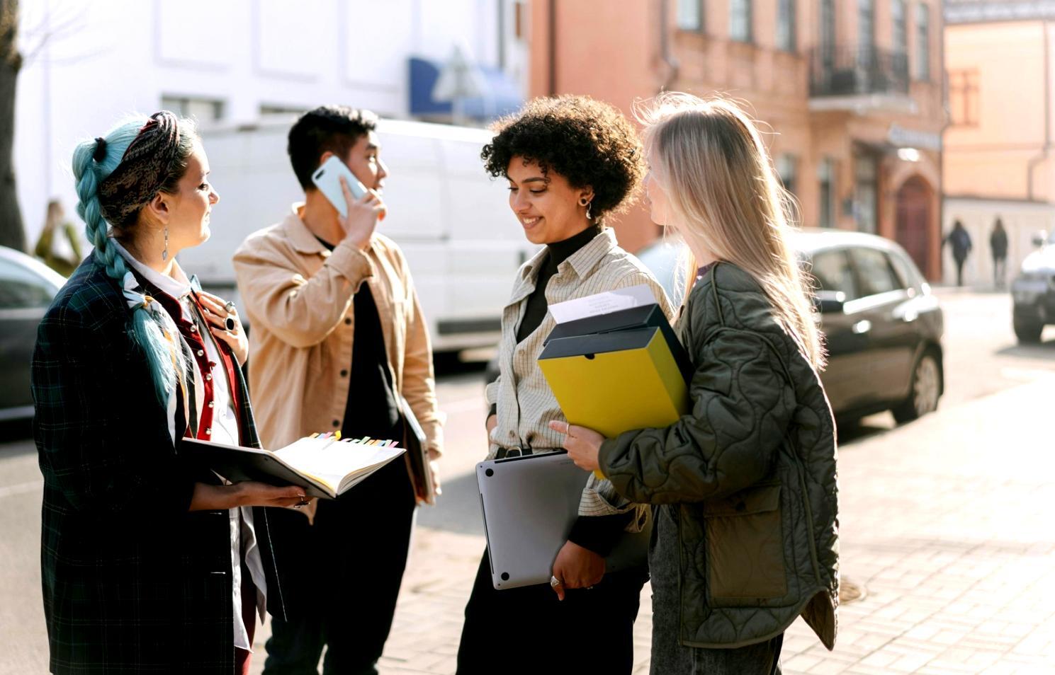 Instructors collaborating with students in online learning environment